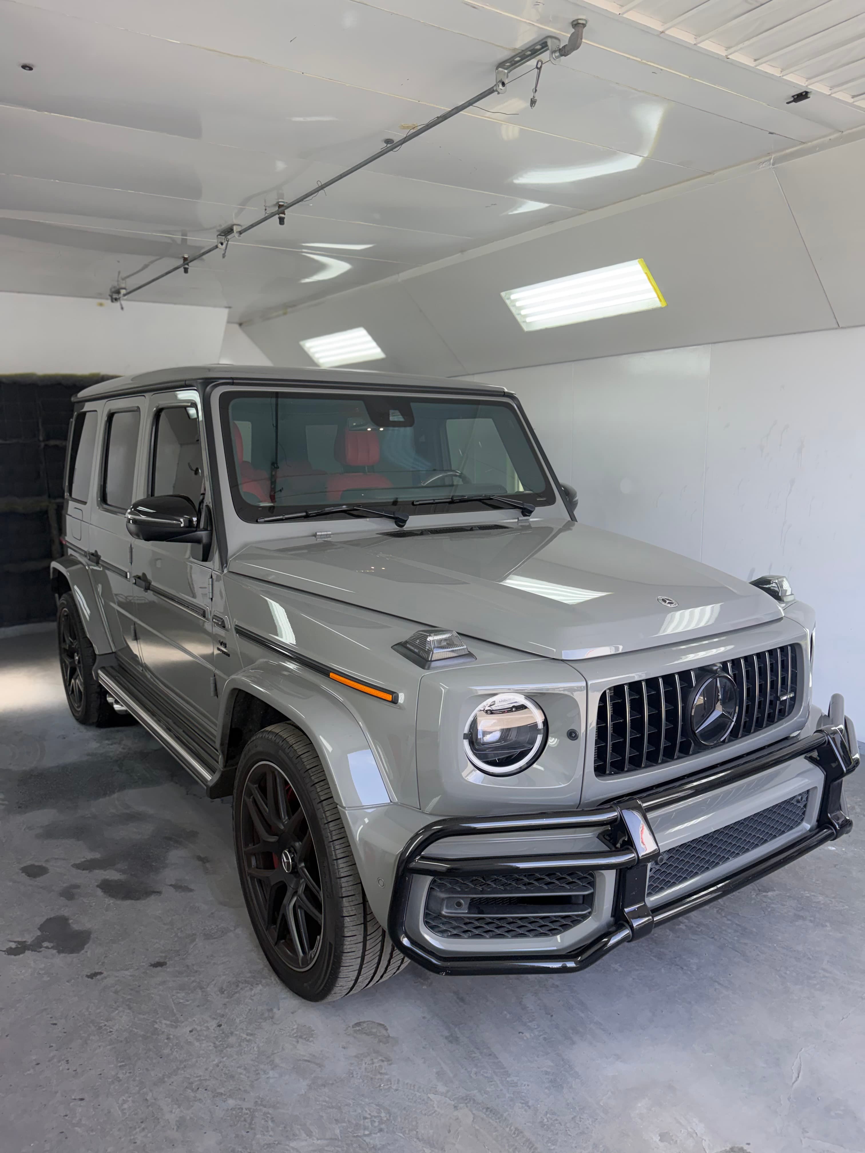 Mercedes-AMG G63 front three-quarter view in the paint booth at D&S Auto Repair in Vallejo, CA